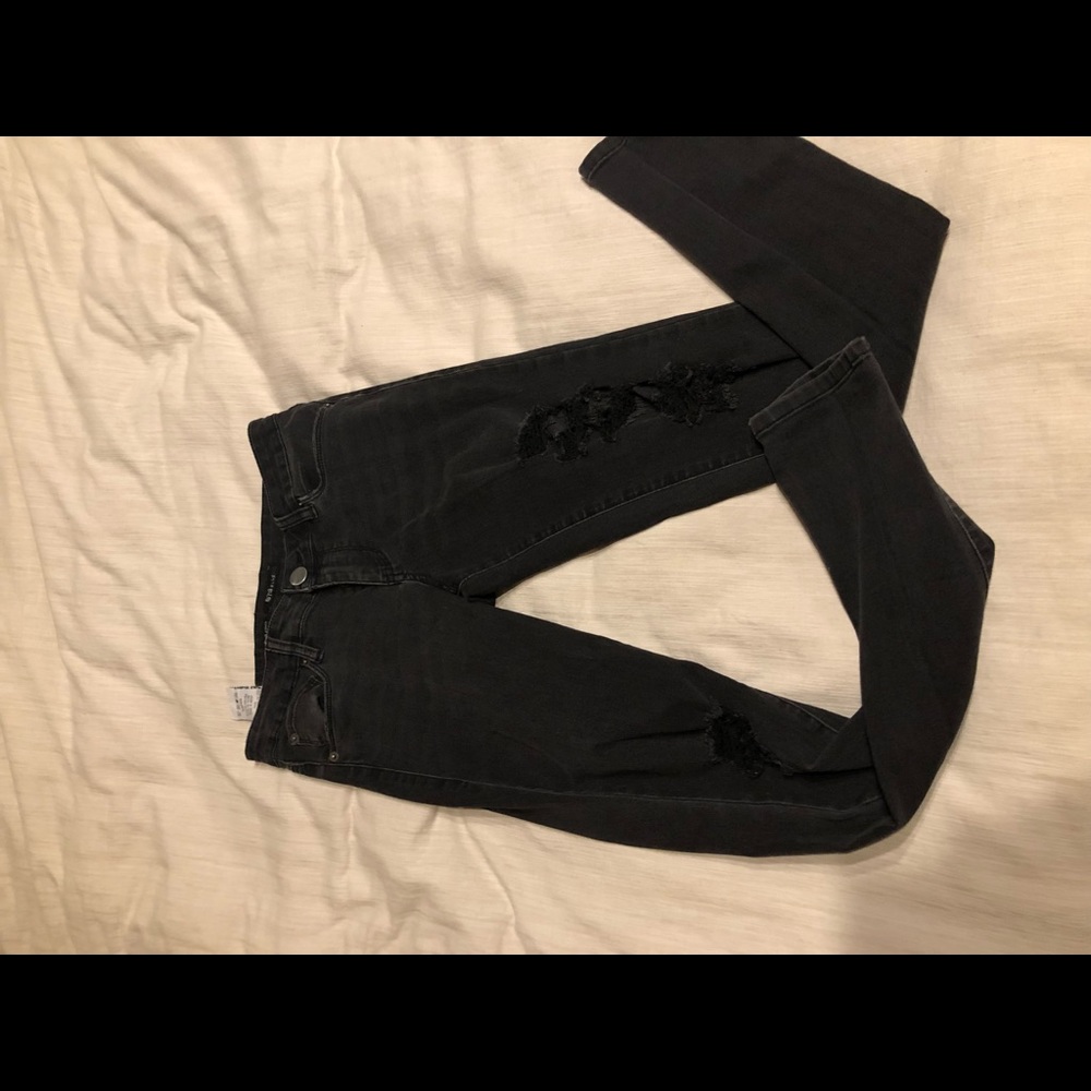 Distressed black jeans